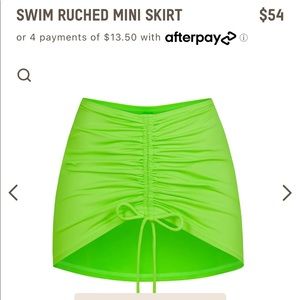 COPY - Swim ruched mini skirt. Medium. Brand new with tags.